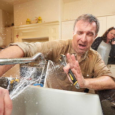 Water splashing on to home owner